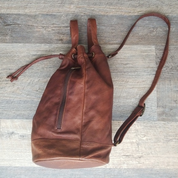 Wilsons Leather Handbags - Leather Rugged Drawstring Sling Bag Backpack
